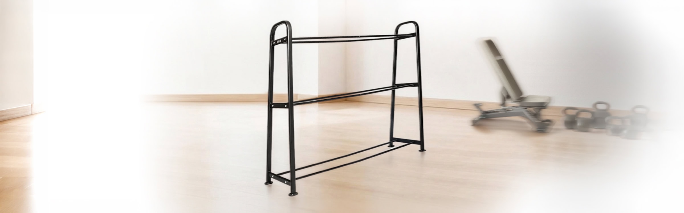 Supporto per stoccaggio di palle da palestra in metallo nero, ideale per attrezzature fitness professionali.