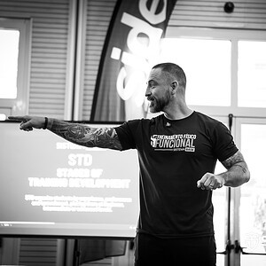 Fitness technician during the StrongFirst Summit 2026 in Cesena, Italy, using high quality equipment for strength and functional training.