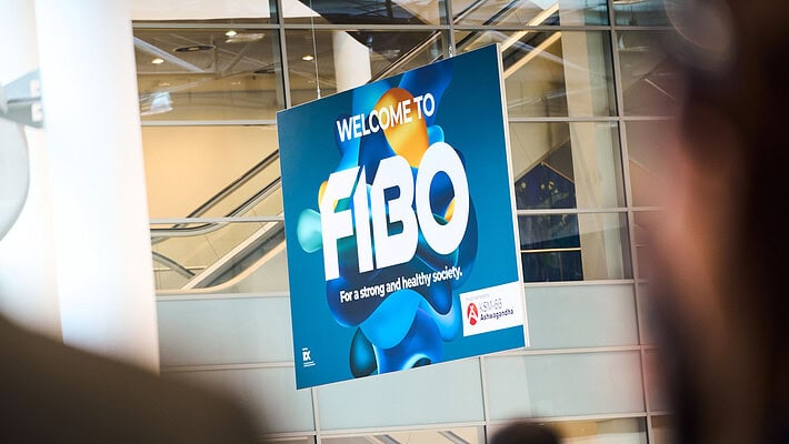 FIBO 2026 welcome panel with logo and welcome message, representing the international event dedicated to professional fitness and wellness equipment.